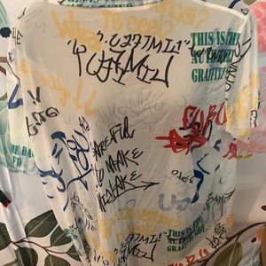 Super cute sheer graphic tee shirt